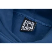 Close-up view of the Sp5der cropped hoodie in navy blue showing the authentic brand interior neck size label detail.
