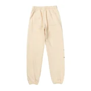 Back view of the premium cream Sp5der Cropped Sweatpants showing the elasticated waistband and relaxed fit design.