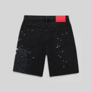 Back view of Sp5der Heavy Web Denim Short in black, featuring a branded leather patch and white web and star prints.