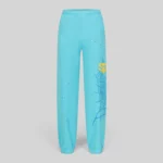 Front view of Sp5der Heavy Web sweatpants in sky blue color featuring a web graphic and star print details.