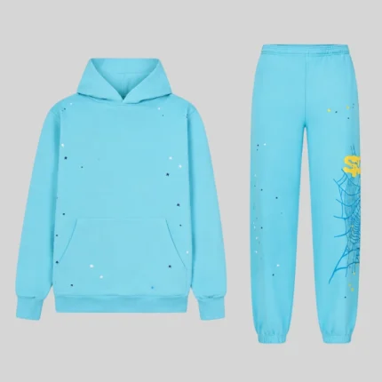 Front view of the Sp5der Heavy Web Tracksuit in sky blue featuring star graphics and signature web print on 13oz cotton.
