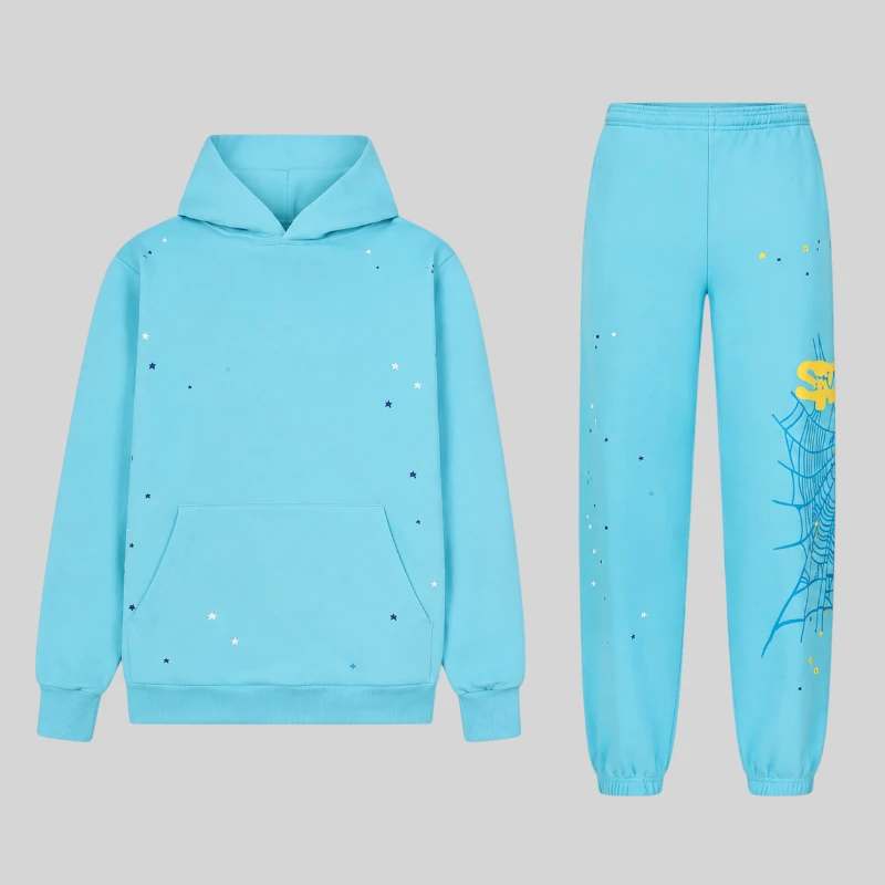 Front view of the Sp5der Heavy Web Tracksuit in sky blue featuring star graphics and signature web print on 13oz cotton.