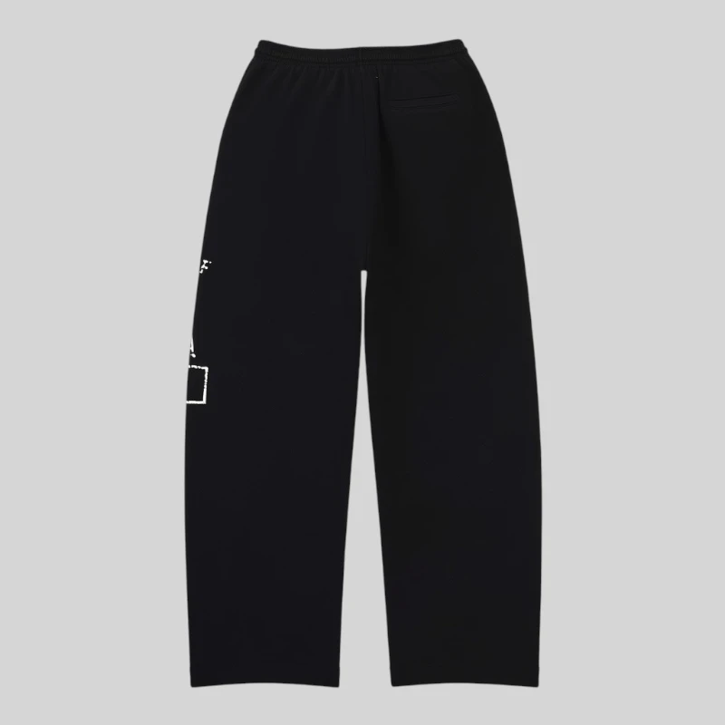 Back view of the black Sp5der Issue 404 sweatpants featuring 13oz premium cotton fleece and signature graphic print