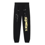 Front view of the black Sp5der Jeffery sweatpants featuring signature star graphics and yellow branding detail.