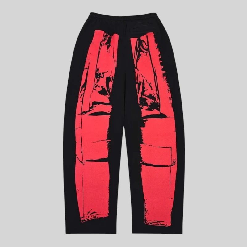 Back view of black Sp5der JP5 Moto Sweatpants with red motocross-inspired graphic print from the FW25 streetwear collection.