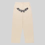 Front view of Sp5der Mixed Stone OG V2 cream sweatpants made from 13oz premium cotton fleece with studded logo detail.