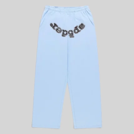 Front view of Sp5der Mixed Stone OG V2 zip sweatpants in Rock Blue featuring signature embellished logo lettering.