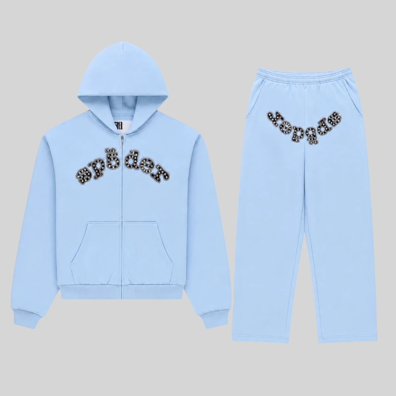 Front view of the Sp5der Mixed Stone OG V2 Zip Tracksuit in Rock Blue featuring heavy cotton fleece and metal studs.
