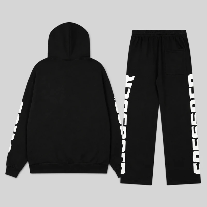 Back view of the black Sp5der Mx555 zip tracksuit with signature graphic print on the hoodie sleeves and track pants