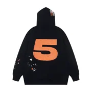 Back view of the Sp5der Nocturnal Highway Hoodie in black with a large orange number 5 print and distressed detailing.