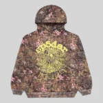 Front view of the brown Sp5der OG Web Real Tree hoodie featuring yellow logo puff print and pink floral camo pattern.