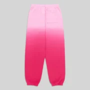 Back view of Sp5der OG Web Ombre Sweatpants in pink color made from heavyweight 13oz cotton fleece for streetwear style