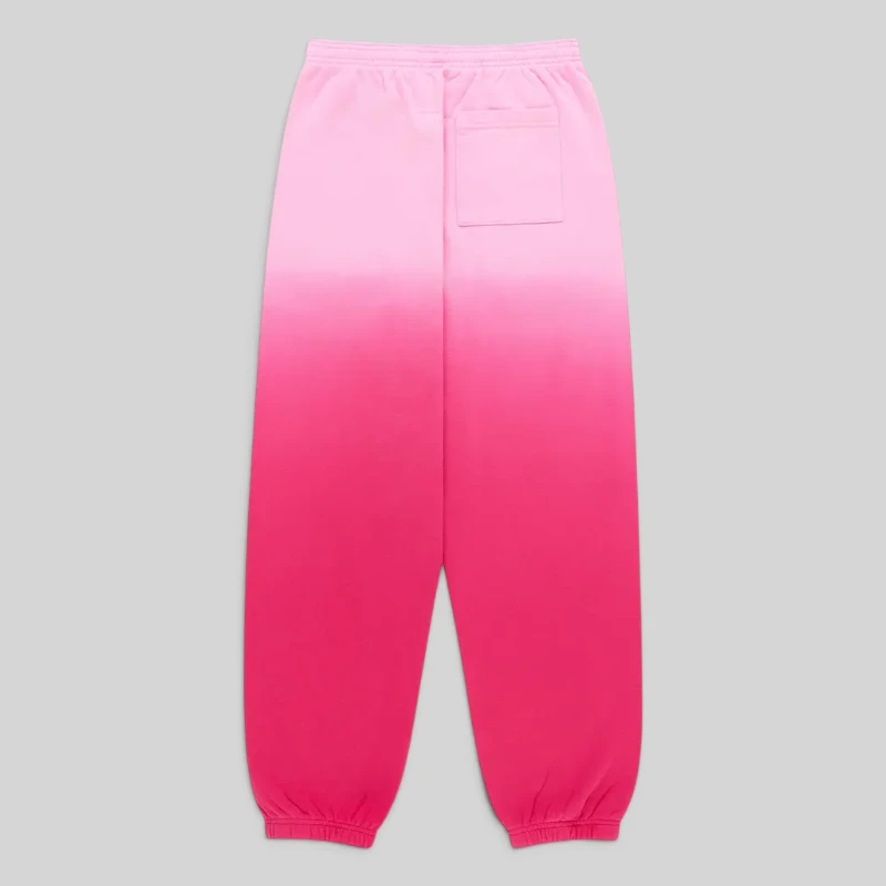 Back view of Sp5der OG Web Ombre Sweatpants in pink color made from heavyweight 13oz cotton fleece for streetwear style