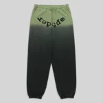 Front view of the Sp5der OG Web Ombre sweatpants in black featuring a unique gradient design and puff print branding.
