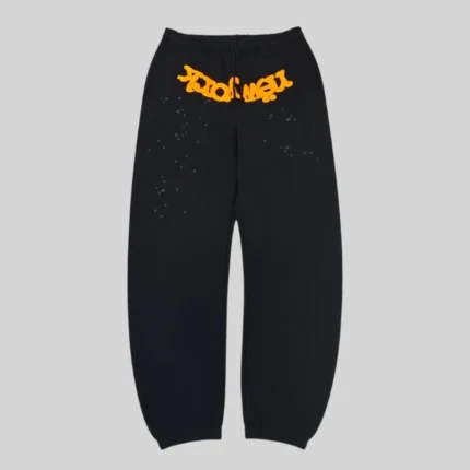 Front view of black Sp5der OG Web V2 Knicks Alternate Sweatpants featuring orange puff print and star details.