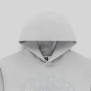 Closeup detail of the Sp5der OG Web V2 Ombre Hoodie in Sport Grey showing the premium cotton fleece and web graphic.