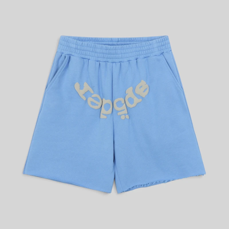 A front view of the light blue Sp5der OG Web V2 sweatshorts featuring the signature web logo detail on the front.