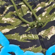 Close-up view showing the fabric texture and drawstring details of the Sp5der OG Web V2 Tiger Camo Sweatshorts.