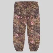 Back view of the Sp5der OG Web sweatpants featuring a camouflage Real Tree print pattern with floral accents.