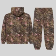 Back view of the Sp5der OG Web Real Tree Tracksuit featuring brown camouflage fleece and vibrant pink floral accents.