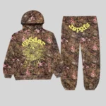 Sp5der OG Web Tracksuit in Real Tree camo featuring a brown fleece base, pink floral accents, and yellow branding.