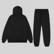 Back view of the Sp5der OG Web Studded tracksuit in black, showing the premium hoodie and matching sweatpants set.