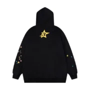 Back view of the black Sp5der P*NK hoodie featuring yellow star branding and colorful star accents on sleeves.