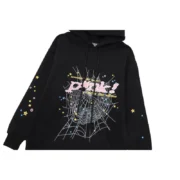 Close-up view of the black Sp5der P*NK hoodie featuring signature graphic web and star print designs on the front.