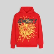Front view of the heavy-duty red Sp5der P*NK V2 hoodie featuring a bold yellow web graphic and black Sp5der logo print.