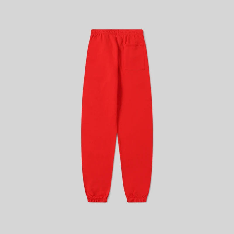 Back view of the Sp5der P*NK V2 Sweatpants in red, featuring premium heavyweight fleece and a comfortable elastic fit.