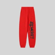 Front view of the Sp5der P*NK V2 sweatpants in red featuring black puff print logo and star detailing.