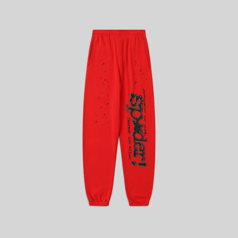 Front view of the Sp5der P*NK V2 sweatpants in red featuring black puff print logo and star detailing.