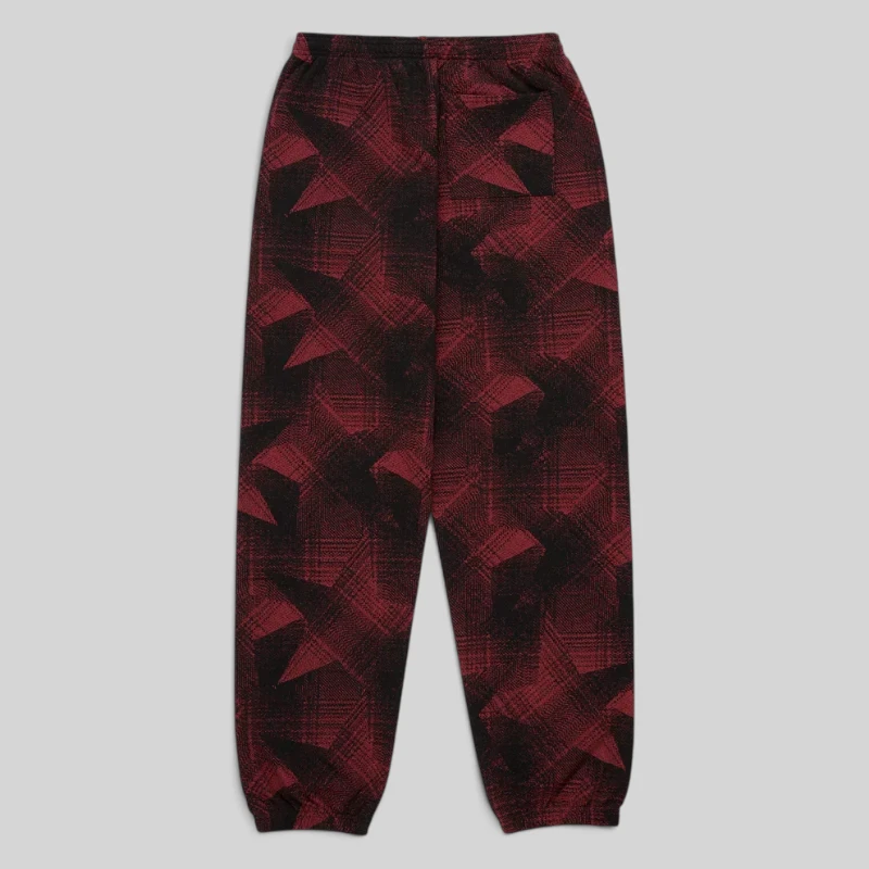 Rear view of the Black Sp5der Plaid Splatt Sweatpants featuring a heavyweight cotton fleece design and plaid pattern.