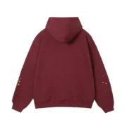 Back view of the Sp5der P*nk Hoodie in maroon, featuring long sleeves with subtle star graphic design details.