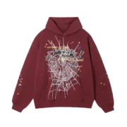 Front view of the Sp5der P*nk Hoodie in a bold maroon color featuring a white spiderweb design and iconic branding.