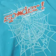 Close-up of the Sp5der Punk V2 Hoodie in Sky Blue featuring a signature puff print logo and web graphic design.
