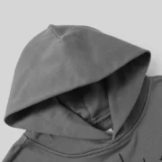 Close-up view of the hood on the premium heavyweight grey Sp5der Punk V2 hoodie made from soft 100% cotton fleece
