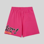 Back view of the pink Sp5der Punk V2 sweatshorts featuring a raw hem and graphic print on 100% cotton fleece.