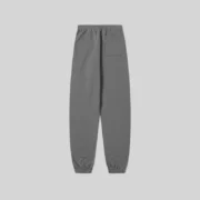 Back view of the Sp5der Punk V2 Sweatpants in grey, featuring a 13oz cotton fleece design with an elasticized cuff.