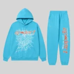 Sp5der Punk V2 Tracksuit in Sky Blue featuring premium 13oz cotton fleece with signature spider web and logo graphics.