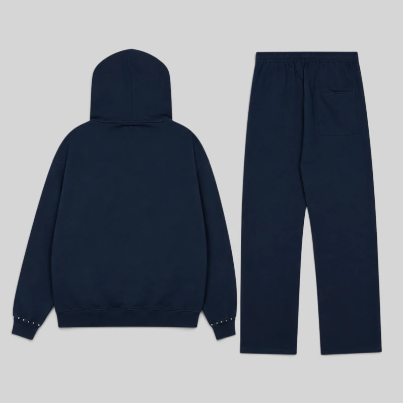 Back view of the dark blue Sp5der Punk V3 studded tracksuit featuring hoodie and sweatpants set from the archive.
