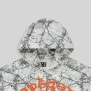 Sp5der Realtree OG Web V2 Zip Hoodie in white camo colorway, featuring signature orange graphic print on front
