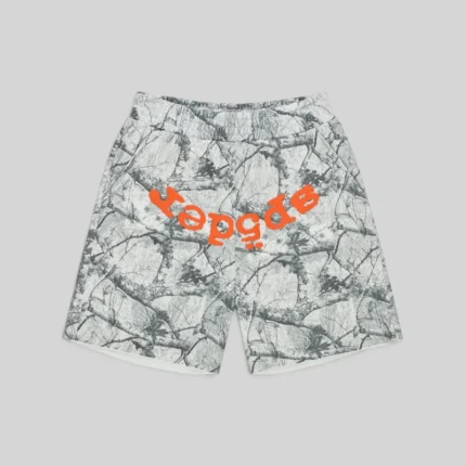 Front view of Sp5der Realtree OG Web V2 Zip Shorts in white camo with orange branding detail on a plain background.