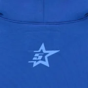Closeup of the Sp5der Rhinestone Punk V2 blue hoodie featuring the signature star logo detail on the back neckline.