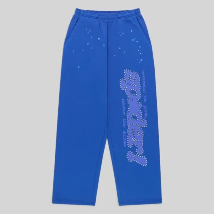 Sp5der Rhinestone Punk V2 sweatpants in blue featuring rhinestone-lined lettering and a scattered star print design.