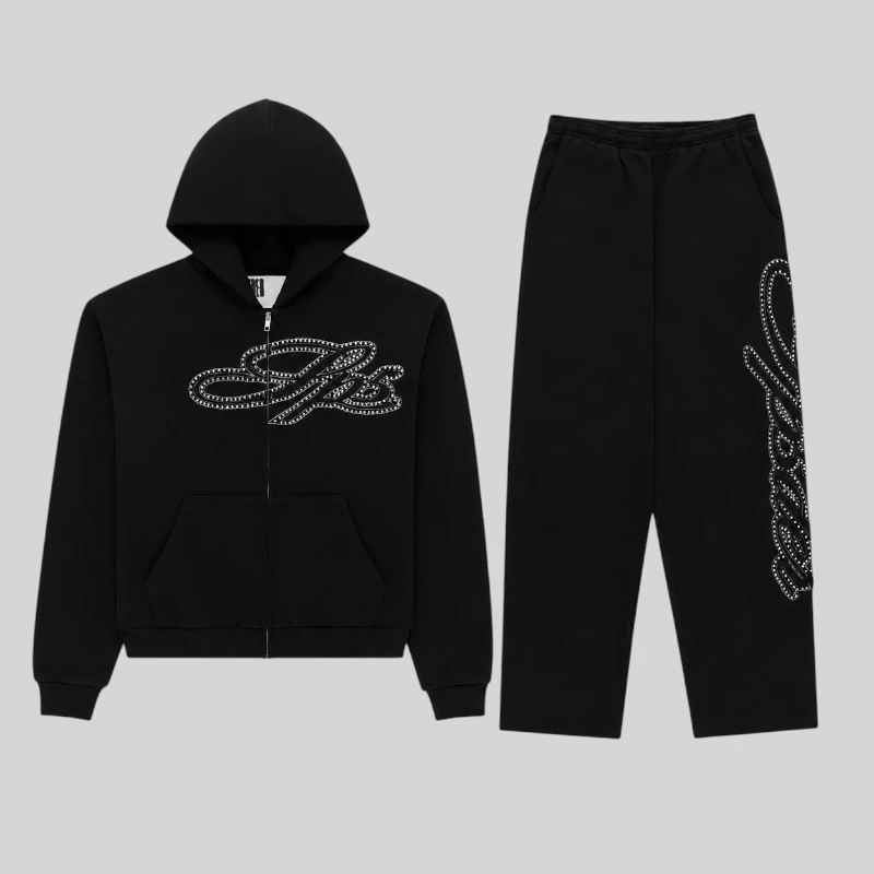 Front view of the Sp5der Rhinestone Script Full Zip Tracksuit in Black featuring a stylish hoodie and matching joggers