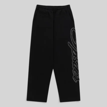 Front view of Sp5der Rhinestone Script sweatpants in black made from 13oz heavy cotton fleece with rhinestone detail.