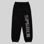 Front view of black Sp5der rhinestone silk sweatpants with branded detailing and scattered crystal accents