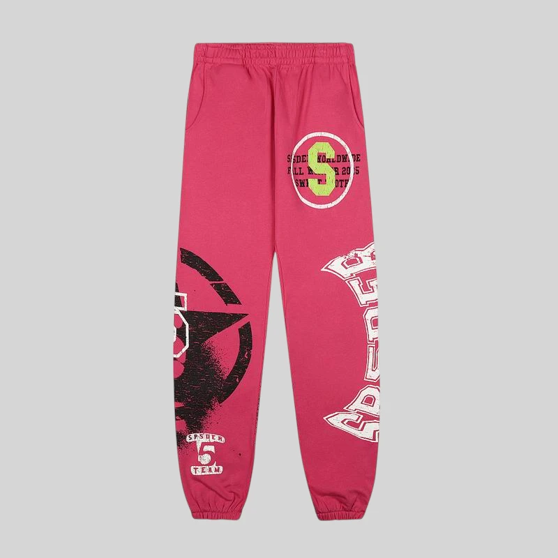 Sp5der Stencil Sweatpants in Pink featuring a relaxed fit, bold graphic stencil prints, and high-quality cotton fleece.