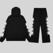 Back view of the premium Sp5der Stone Tracksuit in black featuring the iconic graphic web print and cotton fleece fabric